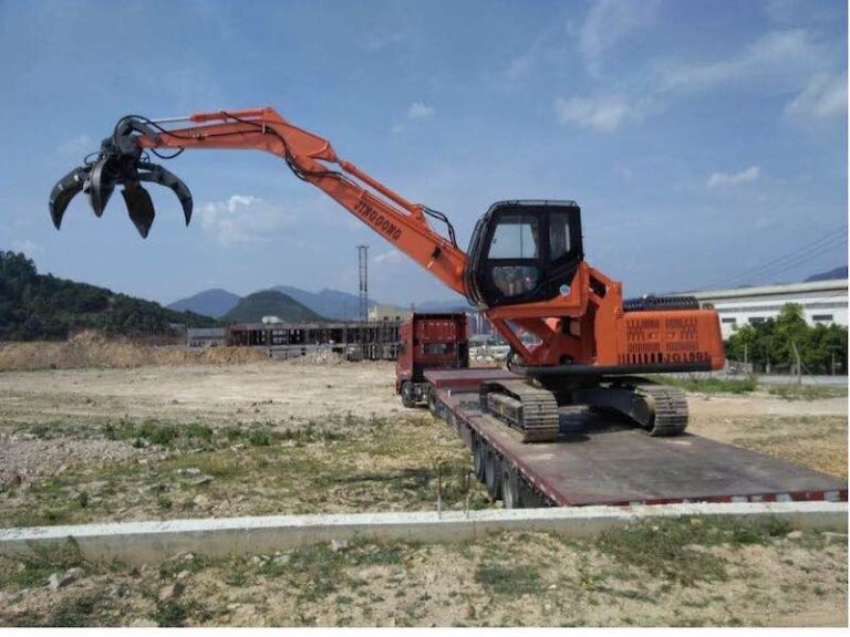 Scrap metal orange grab excavator